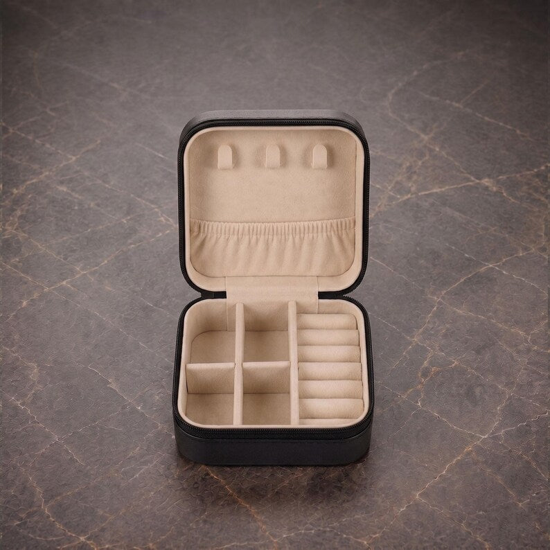Black leather jewelry travel case interior compartments