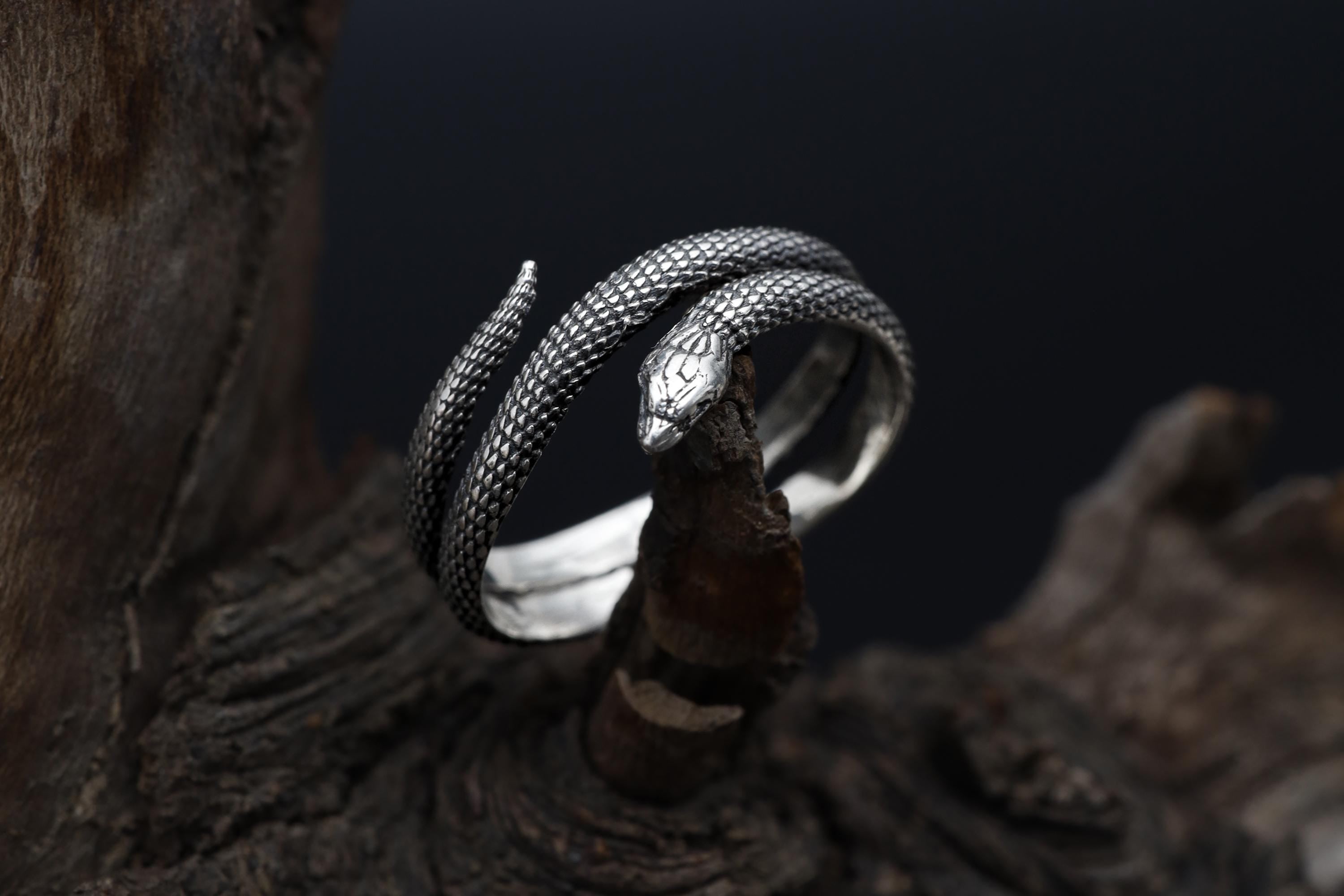 Twisted snake ring, 925 sterling silver gothic serpent band, handmade reptile jewelry, and bold statement piece designed for those who are drawn to mystery, transformation, and powerful symbolism. This striking ring features a detailed serpent form wrapping around the band, creating a look that feels fluid, intense, and visually captivating. It is not just a ring — it is a statement piece that blends gothic aesthetics, animal symbolism, and moder