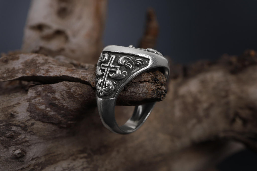 Jesus Crucifix ring, faith inspired religious jewelry, symbolic Christian statement band, and handcrafted bold accessory designed for those who are drawn to devotion, spirituality, faith, and timeless Christian symbolism. This striking ring features a detailed depiction of Jesus on the Holy Crucifix, carefully engraved onto a bold signet face, creating a powerful appearance inspired by Christian tradition, sacred art, and enduring faith.