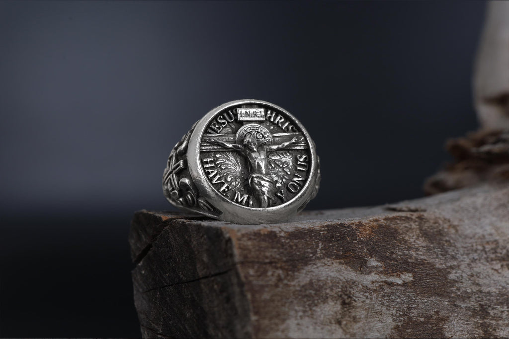 Jesus Crucifix ring, faith inspired religious jewelry, symbolic Christian statement band, and handcrafted bold accessory designed for those who are drawn to devotion, spirituality, faith, and timeless Christian symbolism. This striking ring features a detailed depiction of Jesus on the Holy Crucifix, carefully engraved onto a bold signet face, creating a powerful appearance inspired by Christian tradition, sacred art, and enduring faith.