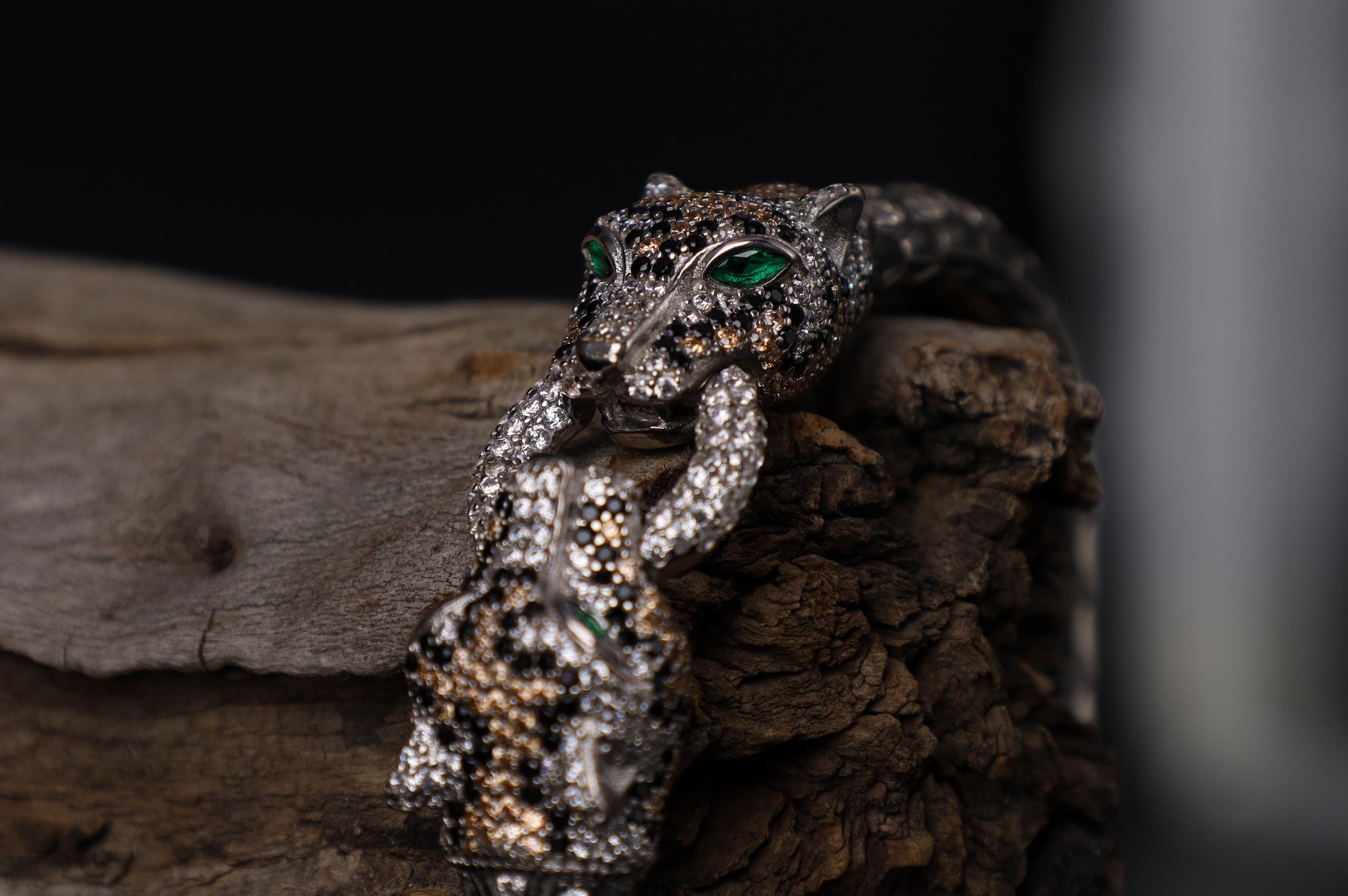 Silver Panther bracelet for men, sterling silver panther bracelet, panther head jewelry, luxury animal bracelet, men's statement bracelet, and handcrafted bold accessory designed for those who appreciate strength, confidence, and timeless craftsmanship. This striking bracelet features detailed panther heads connected by an intricately textured band, creating a commanding design inspired by the elegance, agility, and dominance of one of nature