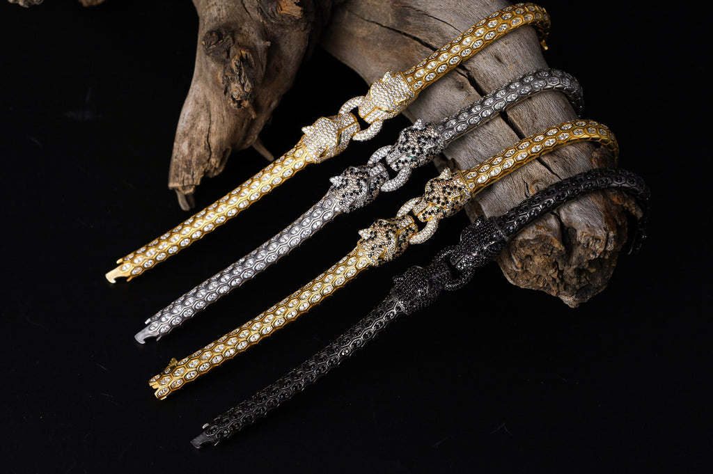Silver Panther bracelet for men, sterling silver panther bracelet, panther head jewelry, luxury animal bracelet, men's statement bracelet, and handcrafted bold accessory designed for those who appreciate strength, confidence, and timeless craftsmanship. This striking bracelet features detailed panther heads connected by an intricately textured band, creating a commanding design inspired by the elegance, agility, and dominance of one of nature