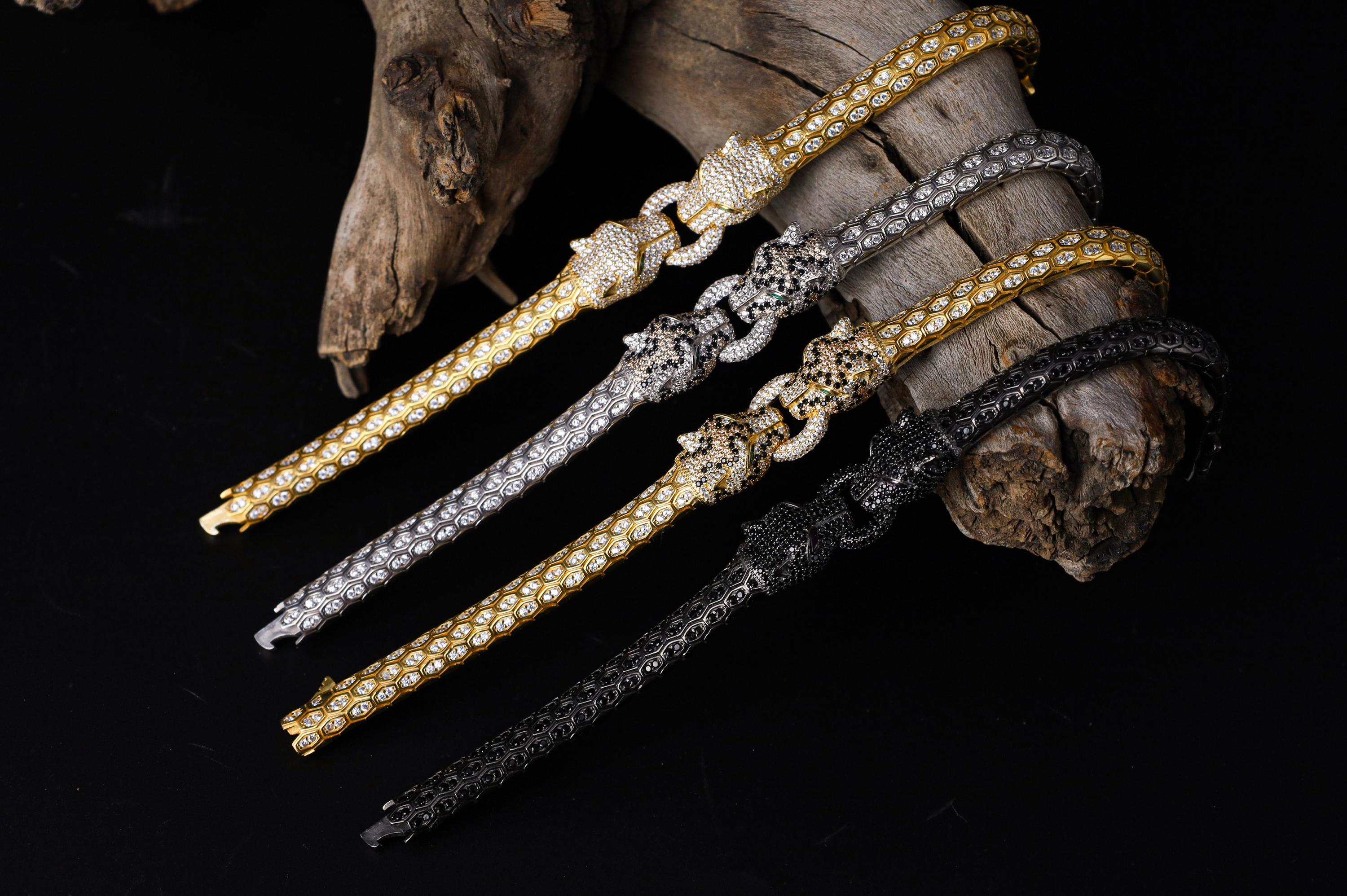 Silver Panther bracelet for men, sterling silver panther bracelet, panther head jewelry, luxury animal bracelet, men's statement bracelet, and handcrafted bold accessory designed for those who appreciate strength, confidence, and timeless craftsmanship. This striking bracelet features detailed panther heads connected by an intricately textured band, creating a commanding design inspired by the elegance, agility, and dominance of one of nature