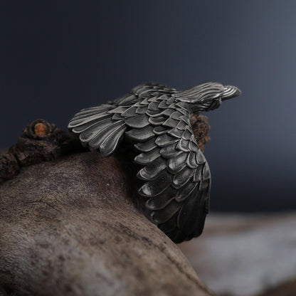 This raven ring for men is a bold and highly detailed design inspired by Norse mythology, Viking symbolism, crow jewelry, and statement men’s rings. Featuring a dramatic spread-wing raven motif, this ring captures the power, intelligence, and mystery long associated with the raven. It is an ideal choice for buyers searching for a Viking raven ring, Norse raven ring, crow ring for men, bird statement ring, or a symbolic men’s ring with a strong an