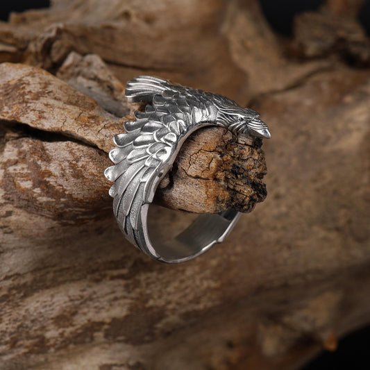 This raven ring for men is a bold and highly detailed design inspired by Norse mythology, Viking symbolism, crow jewelry, and statement men’s rings. Featuring a dramatic spread-wing raven motif, this ring captures the power, intelligence, and mystery long associated with the raven. It is an ideal choice for buyers searching for a Viking raven ring, Norse raven ring, crow ring for men, bird statement ring, or a symbolic men’s ring with a strong an