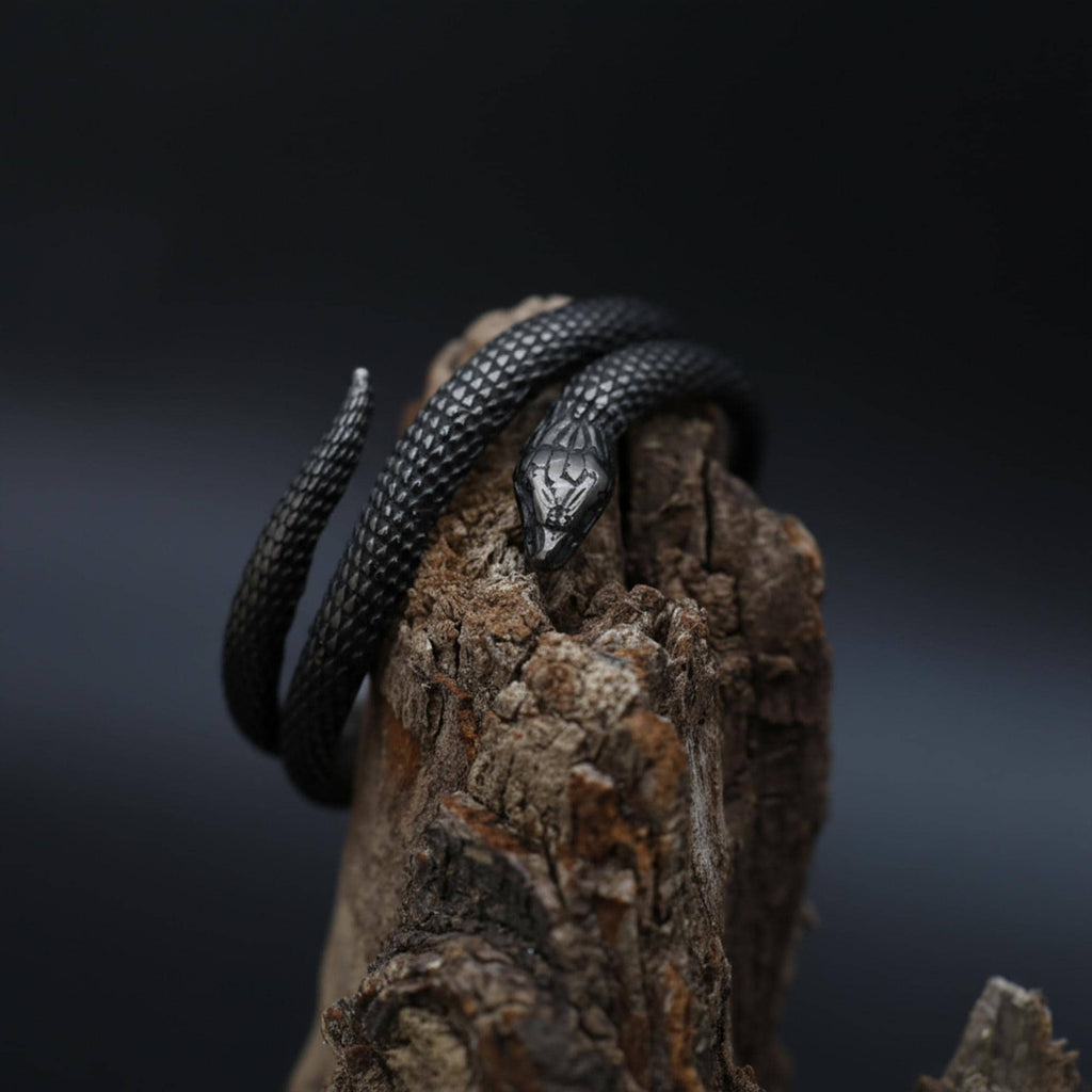 Twisted snake ring, 925 sterling silver gothic serpent band, handmade reptile jewelry, and bold statement piece designed for those who are drawn to mystery, transformation, and powerful symbolism. This striking ring features a detailed serpent form wrapping around the band, creating a look that feels fluid, intense, and visually captivating. It is not just a ring — it is a statement piece that blends gothic aesthetics, animal symbolism, and moder