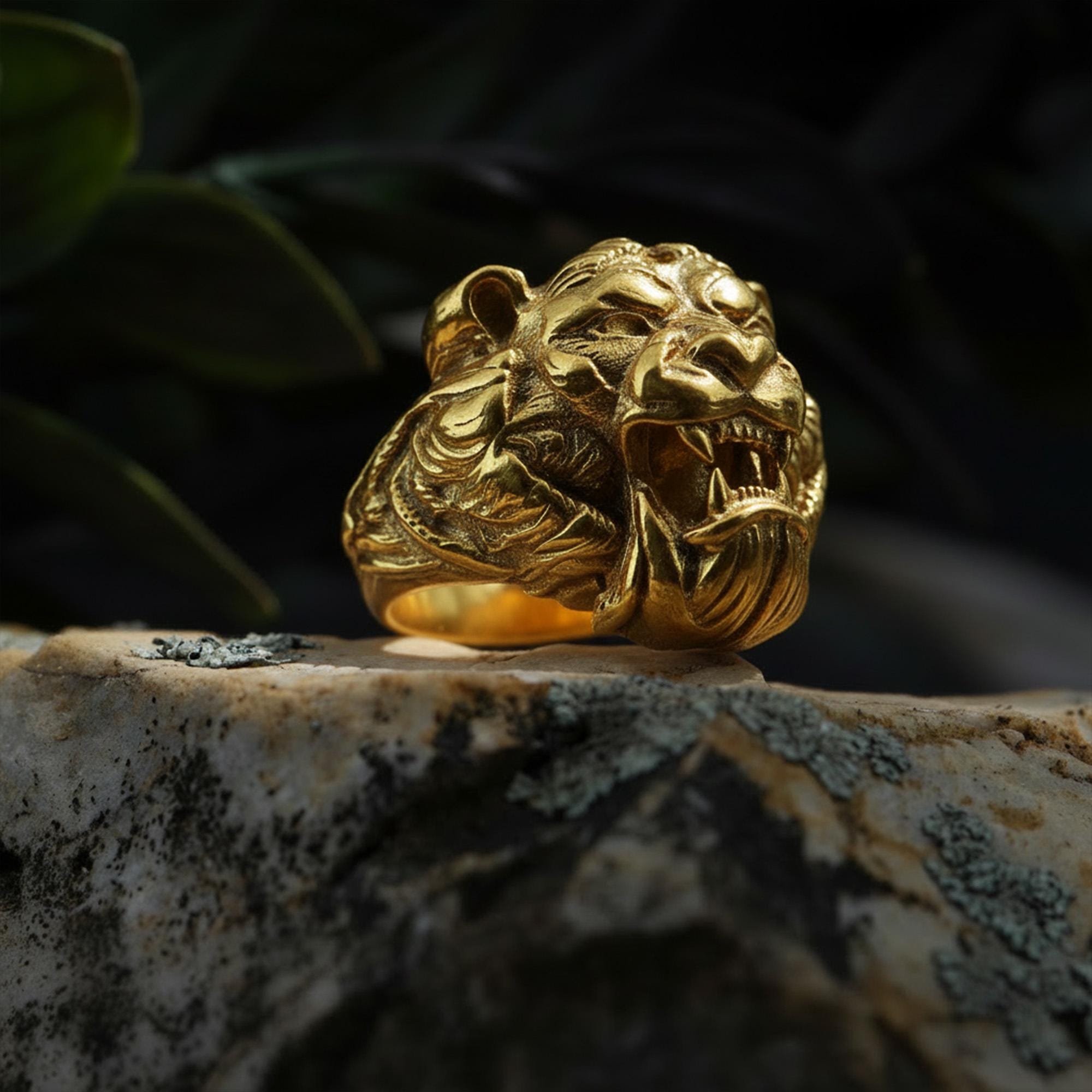 Roaring tiger head ring, sterling silver fierce statement jewelry, symbolic tiger signet band, and handcrafted bold accessory designed for those who are drawn to strength, courage, independence, and untamed energy. This striking ring features a detailed roaring tiger head motif framed within a bold statement structure, creating a look that feels wild, fearless, and deeply symbolic.