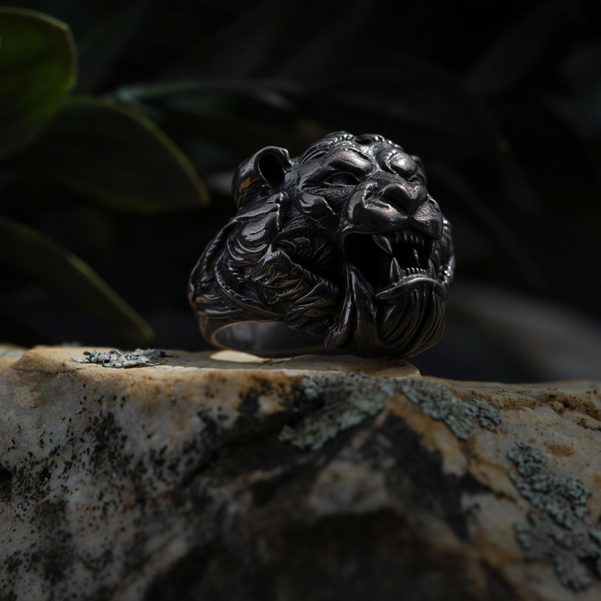 Roaring tiger head ring, sterling silver fierce statement jewelry, symbolic tiger signet band, and handcrafted bold accessory designed for those who are drawn to strength, courage, independence, and untamed energy. This striking ring features a detailed roaring tiger head motif framed within a bold statement structure, creating a look that feels wild, fearless, and deeply symbolic.