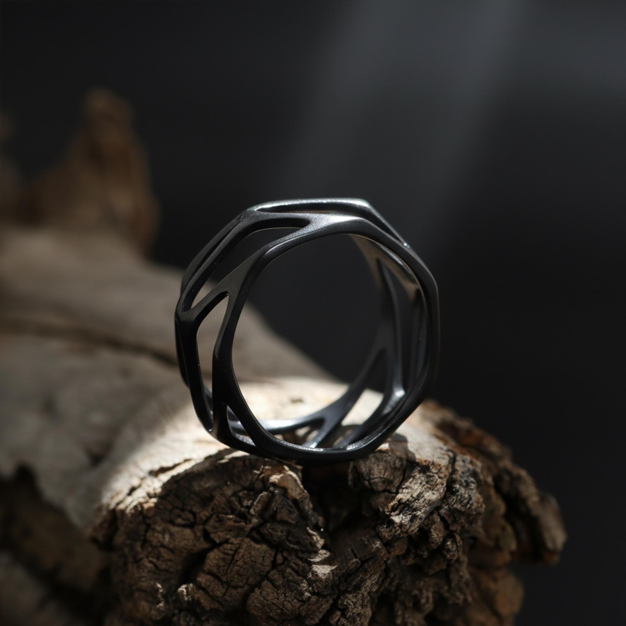 Geometric cage ring, perforated wide band ring, modern openwork band ring, and handcrafted statement ring designed for those who are drawn to bold structure, architectural design, and contemporary aesthetics. This striking ring features a geometric cage-inspired form with perforated cut-out details, creating a look that feels modern, edgy, and visually dynamic
