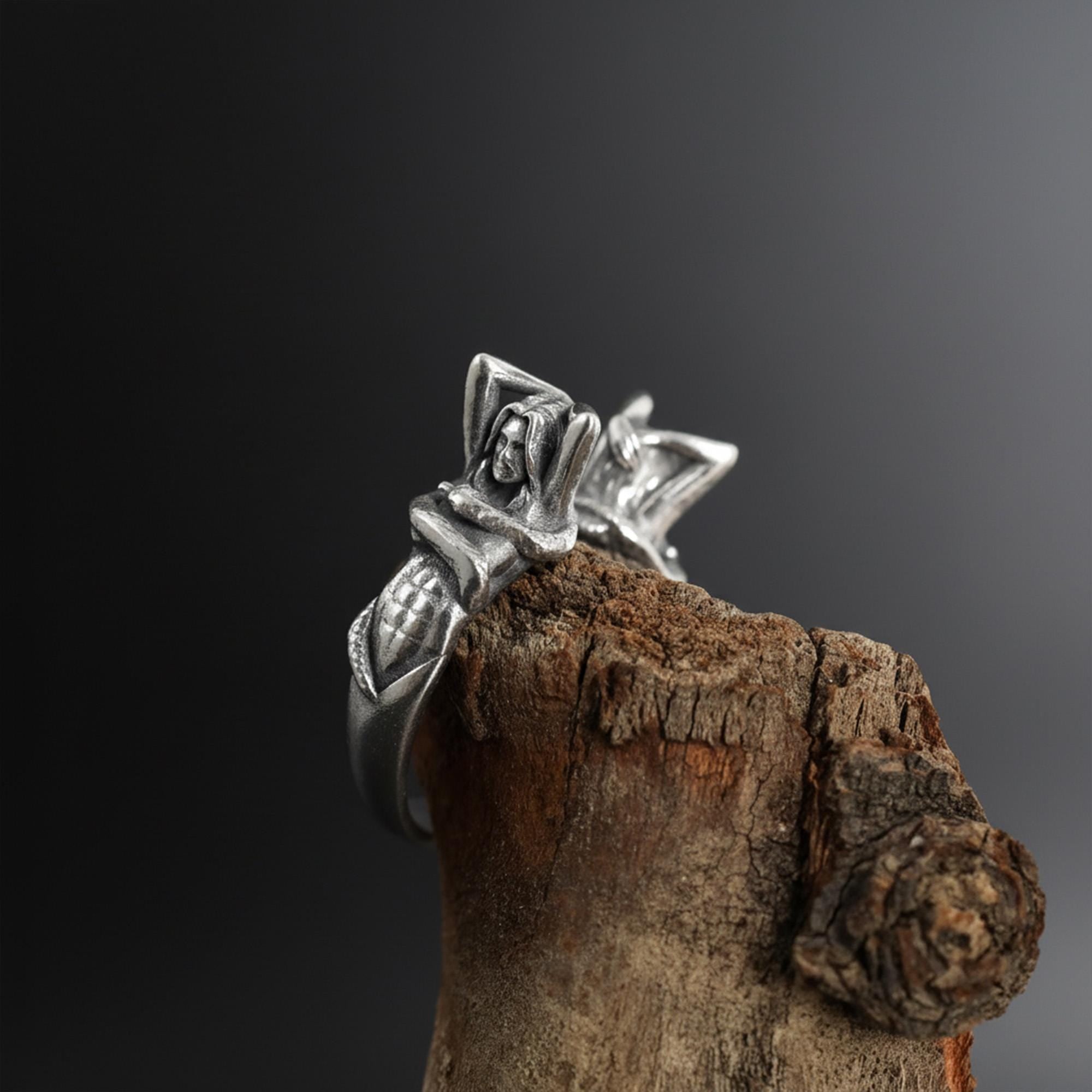 Black silver siren ring, mermaid ring, mythology ring, black rhodium ring, and gothic statement jewelry designed for those who are drawn to dark fantasy, ocean symbolism, and bold artistic design. This striking ring features a sculptural siren-inspired form that creates a mysterious and dramatic presence with strong visual character. It is not a simple accessory — it is a statement ring that blends mythological beauty, dark elegance, and handcraf