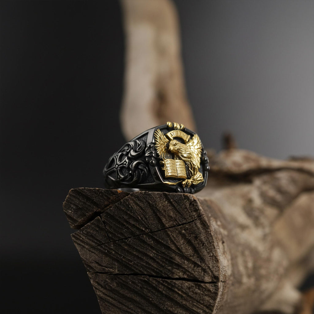 St. John eagle signet ring, sterling silver Christian jewelry, symbolic religious statement band, and handcrafted bold accessory designed for those who are drawn to faith, wisdom, and spiritual strength. This striking ring features a detailed eagle motif inspired by Saint John symbolism, framed within a bold signet structure that creates a look both sacred and powerful.