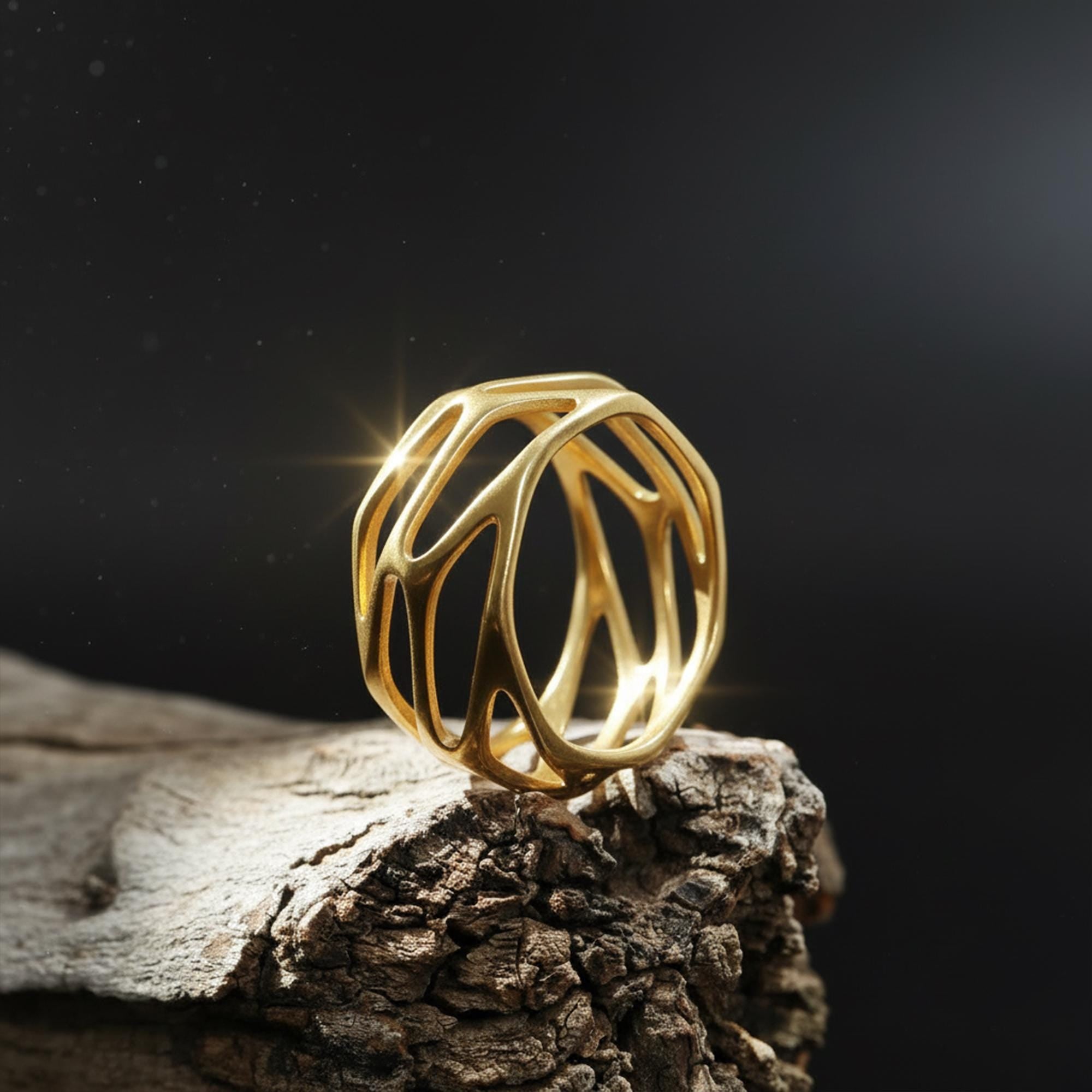 Geometric cage ring, perforated wide band ring, modern openwork band ring, and handcrafted statement ring designed for those who are drawn to bold structure, architectural design, and contemporary aesthetics. This striking ring features a geometric cage-inspired form with perforated cut-out details, creating a look that feels modern, edgy, and visually dynamic