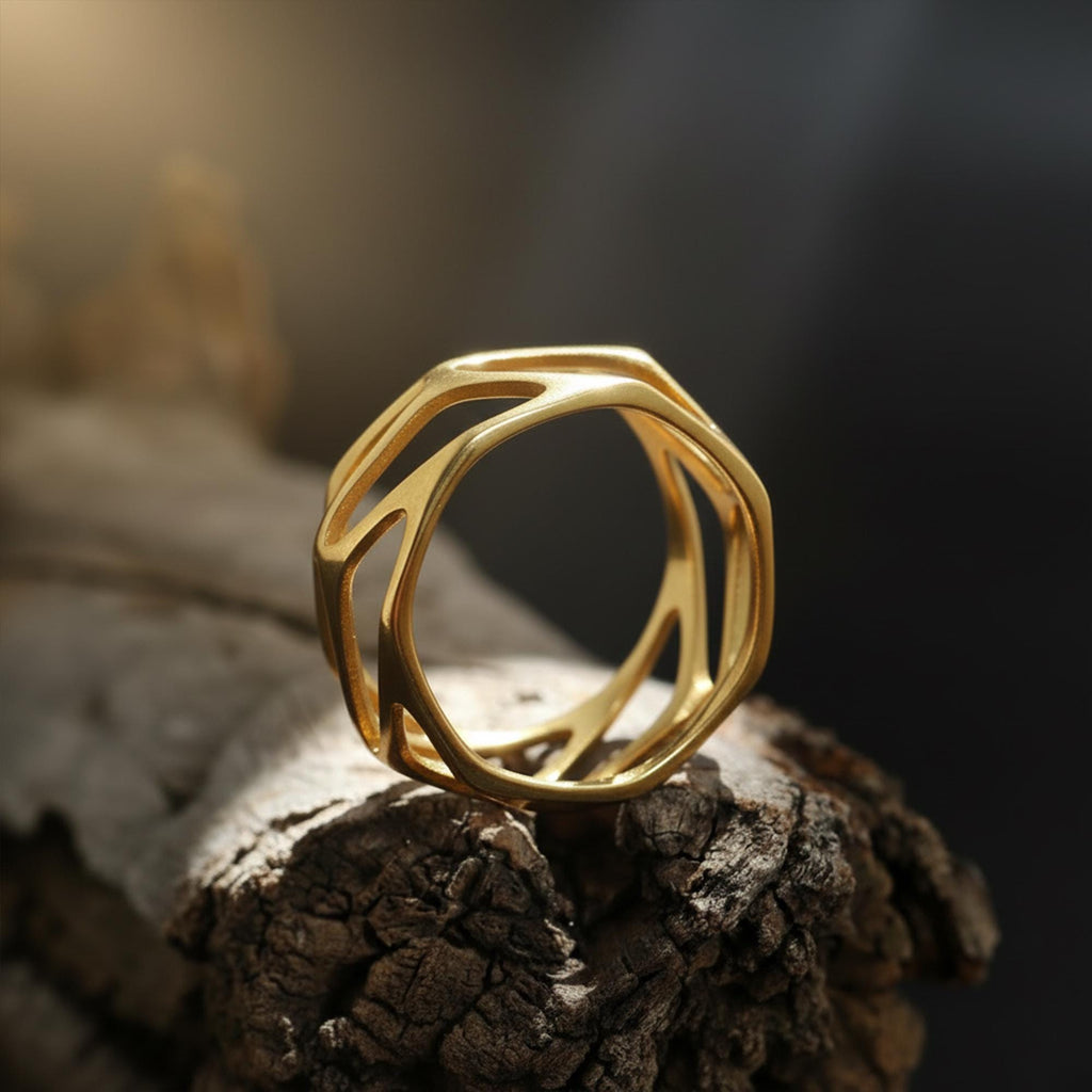 Geometric cage ring, perforated wide band ring, modern openwork band ring, and handcrafted statement ring designed for those who are drawn to bold structure, architectural design, and contemporary aesthetics. This striking ring features a geometric cage-inspired form with perforated cut-out details, creating a look that feels modern, edgy, and visually dynamic