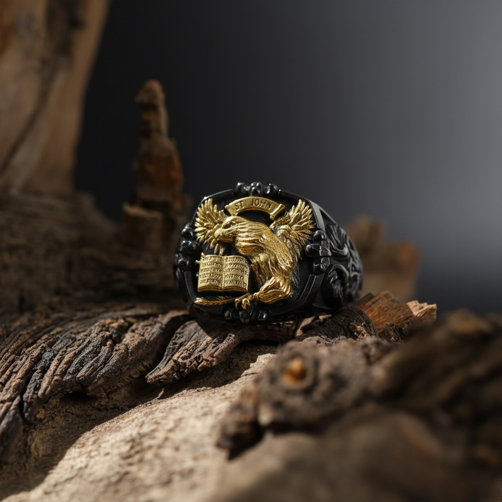 St. John eagle signet ring, sterling silver Christian jewelry, symbolic religious statement band, and handcrafted bold accessory designed for those who are drawn to faith, wisdom, and spiritual strength. This striking ring features a detailed eagle motif inspired by Saint John symbolism, framed within a bold signet structure that creates a look both sacred and powerful.