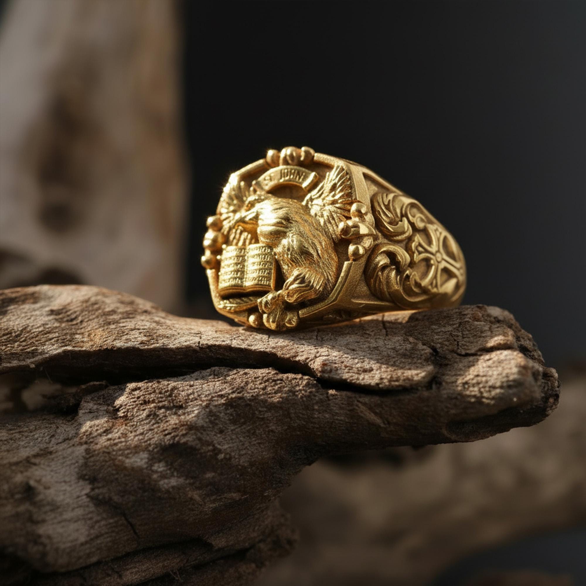 St. John eagle signet ring, sterling silver Christian jewelry, symbolic religious statement band, and handcrafted bold accessory designed for those who are drawn to faith, wisdom, and spiritual strength. This striking ring features a detailed eagle motif inspired by Saint John symbolism, framed within a bold signet structure that creates a look both sacred and powerful.