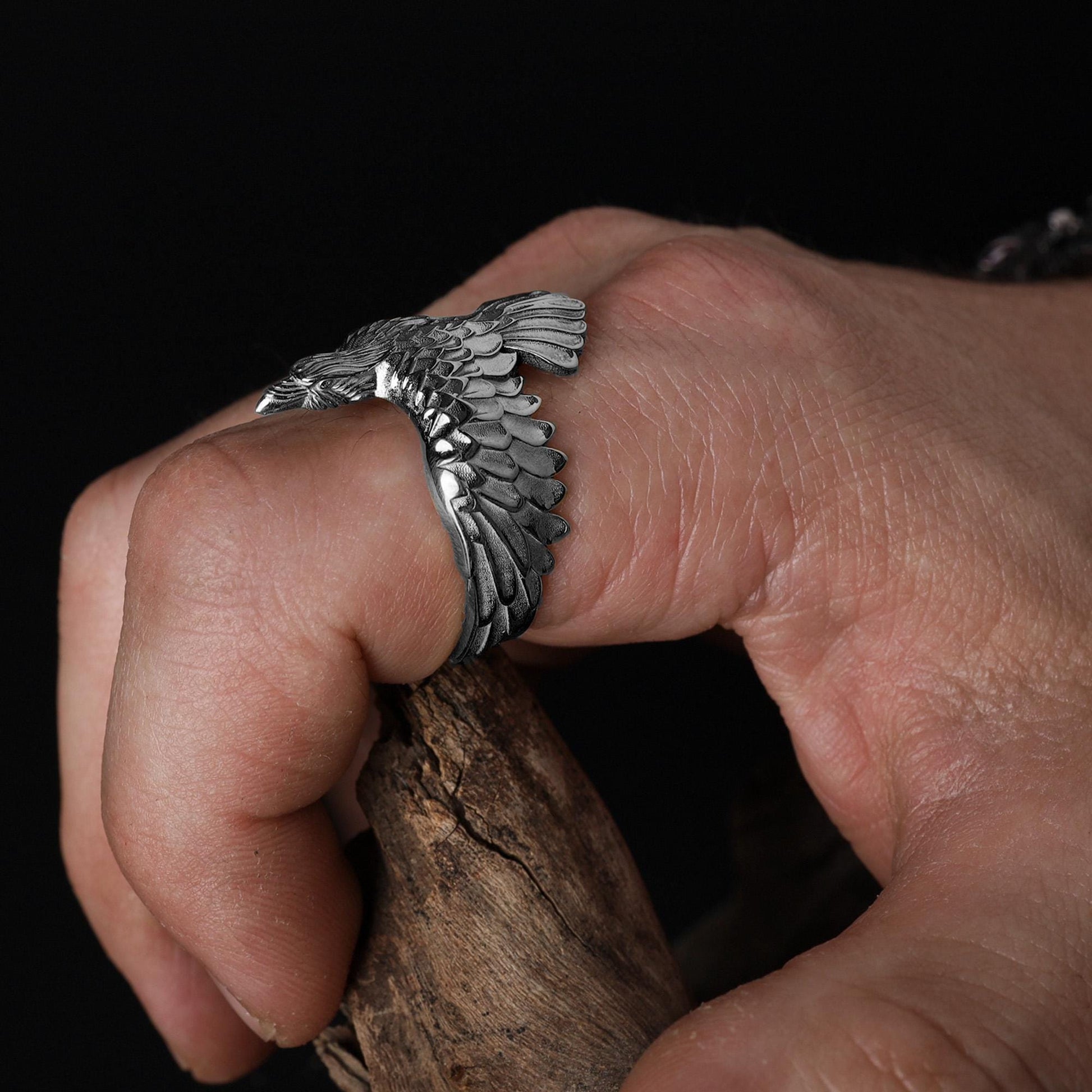 This raven ring for men is a bold and highly detailed design inspired by Norse mythology, Viking symbolism, crow jewelry, and statement men’s rings. Featuring a dramatic spread-wing raven motif, this ring captures the power, intelligence, and mystery long associated with the raven. It is an ideal choice for buyers searching for a Viking raven ring, Norse raven ring, crow ring for men, bird statement ring, or a symbolic men’s ring with a strong an