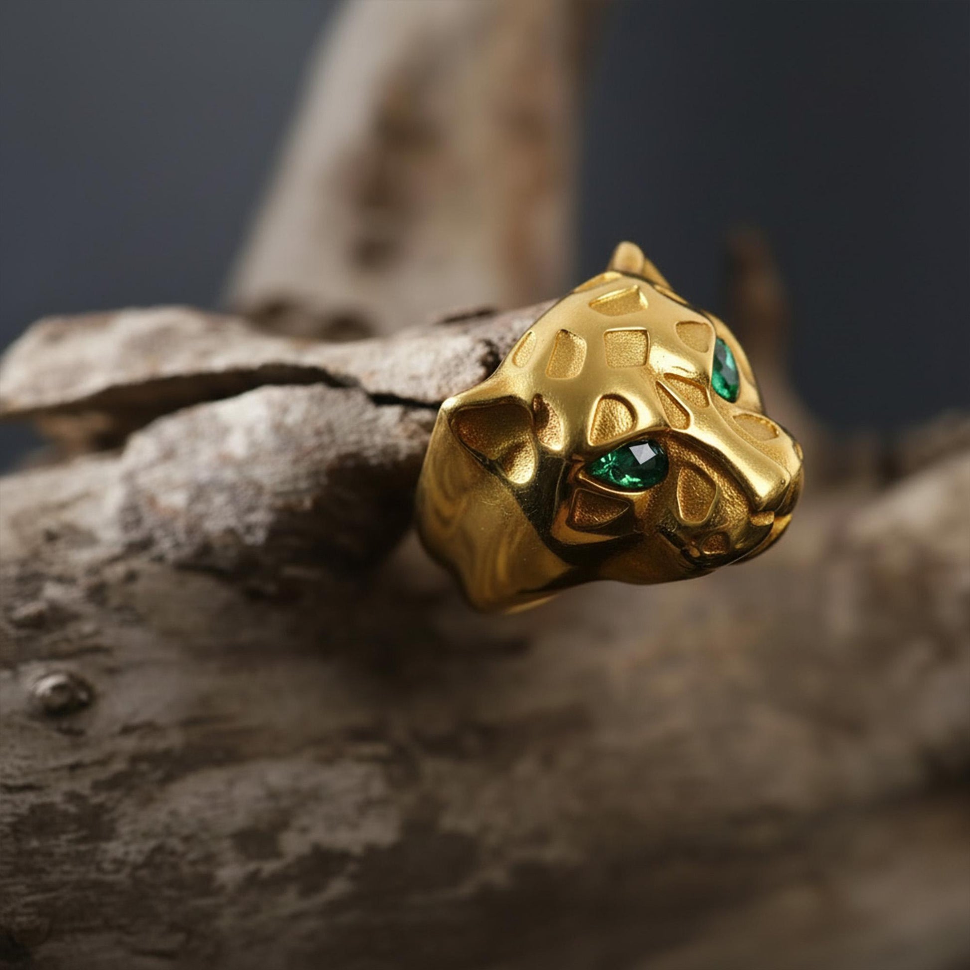 Emerald eyes leopard head ring, panther inspired statement jewelry, symbolic big cat signet band, and handcrafted bold accessory designed for those who are drawn to power, confidence, and fierce elegance. This striking ring features a detailed leopard head motif with vivid emerald stone eyes, creating a luxurious and commanding appearance inspired by wild feline strength and timeless masculine style.
