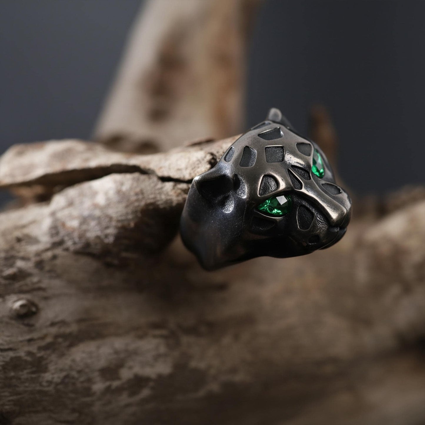 Emerald eyes leopard head ring, panther inspired statement jewelry, symbolic big cat signet band, and handcrafted bold accessory designed for those who are drawn to power, confidence, and fierce elegance. This striking ring features a detailed leopard head motif with vivid emerald stone eyes, creating a luxurious and commanding appearance inspired by wild feline strength and timeless masculine style.