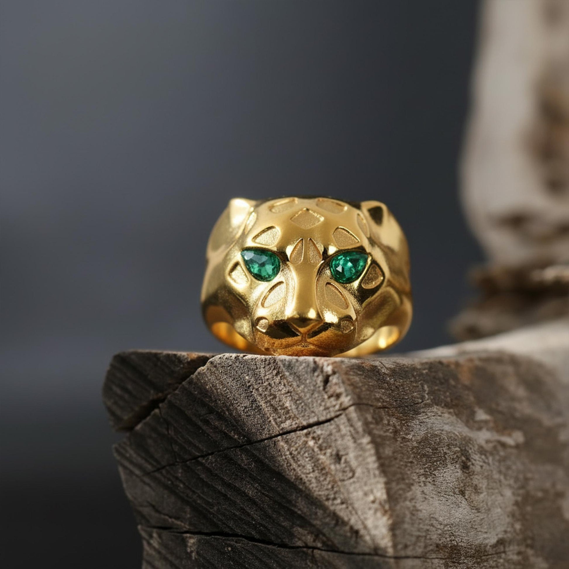 Emerald eyes leopard head ring, panther inspired statement jewelry, symbolic big cat signet band, and handcrafted bold accessory designed for those who are drawn to power, confidence, and fierce elegance. This striking ring features a detailed leopard head motif with vivid emerald stone eyes, creating a luxurious and commanding appearance inspired by wild feline strength and timeless masculine style.
