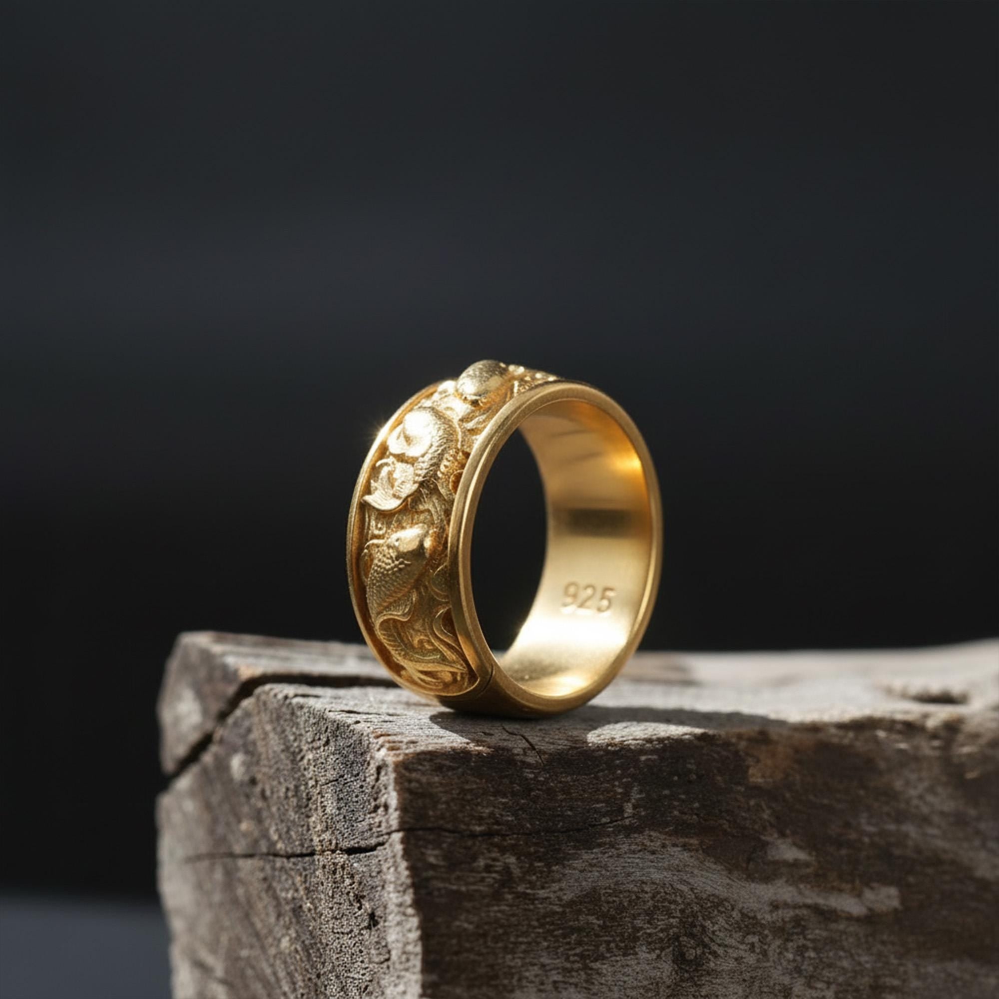 This Koi fish ring for men is a bold and meaningful design created for those who are drawn to Japanese jewelry, symbolic rings, engraved bands, nature-inspired accessories, and statement gold rings. Featuring detailed Koi carp motifs flowing across the band, this ring represents perseverance, transformation, strength, luck, and forward movement.