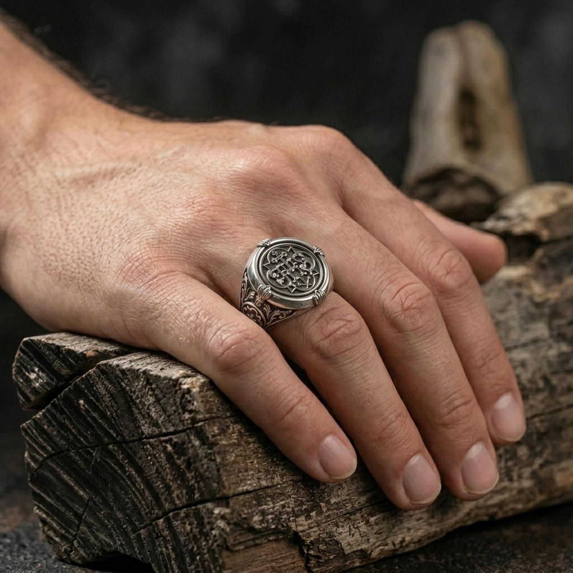 IHS Jesus signet ring, Christian faith inspired jewelry, symbolic religious statement band, and handcrafted meaningful accessory designed for those who are drawn to devotion, spiritual strength, and timeless Christian symbolism. This striking ring features the sacred IHS monogram, one of the most recognized Christograms in Christianity, representing the Holy Name of Jesus.