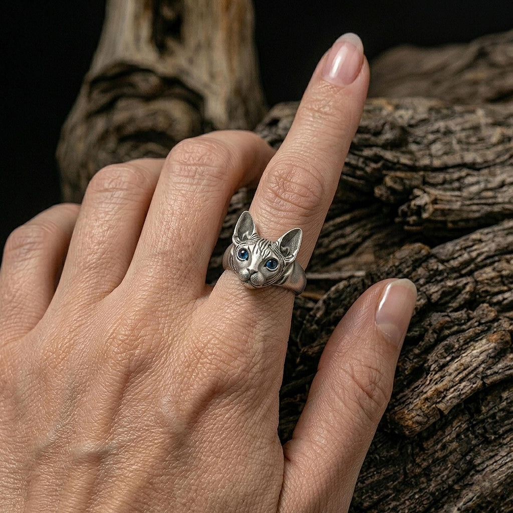 Sphynx cat ring, hairless cat inspired band, Egyptian style animal jewelry, and handcrafted statement ring designed for those who are drawn to elegance, uniqueness, and feline symbolism. This distinctive ring features a detailed Sphynx cat motif, capturing the graceful yet striking presence of this iconic breed, creating a look that feels refined, modern, and expressive.