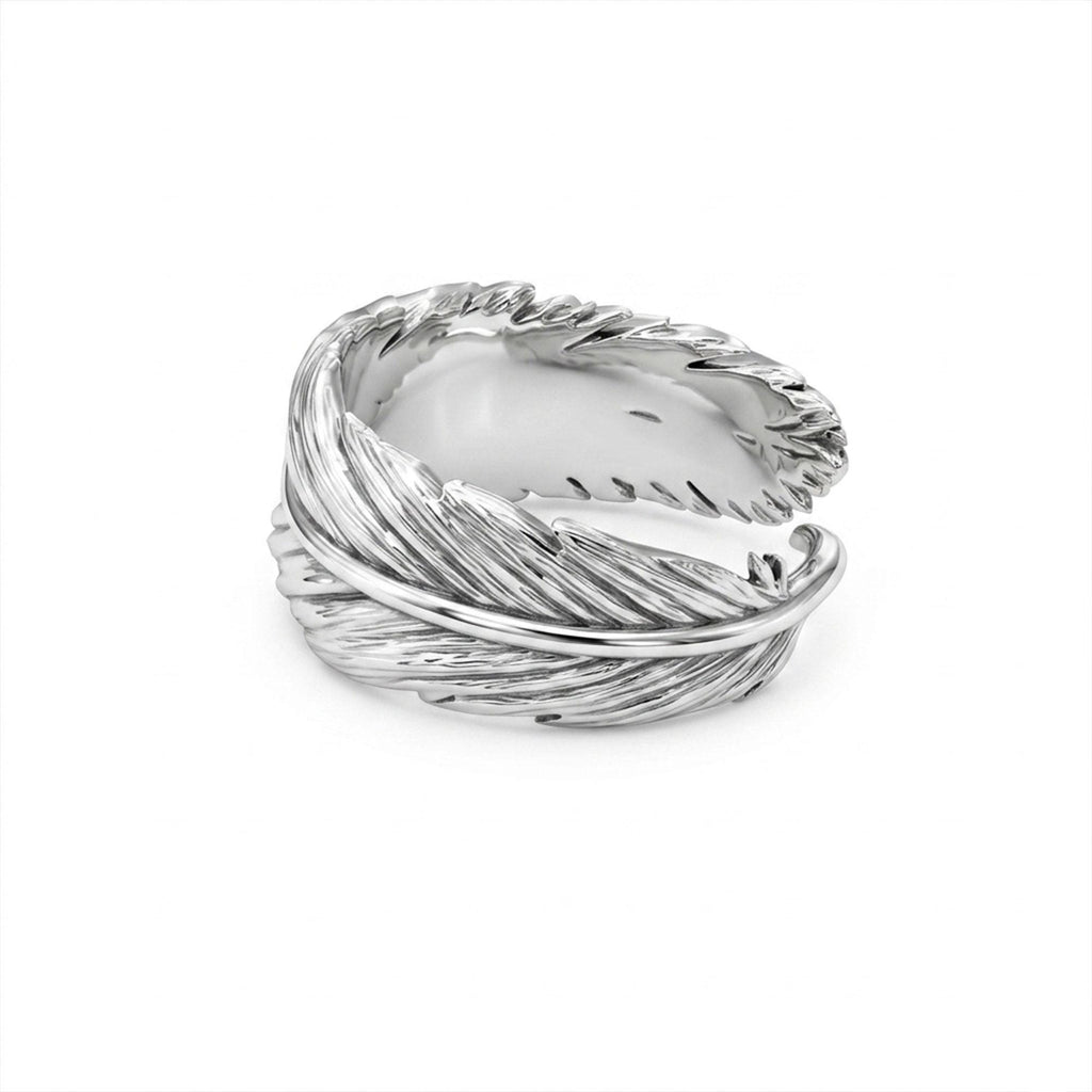 Sterling silver feather band ring, nature inspired men’s wedding ring, engraved feather ring, and handcrafted rustic jewelry designed for those who are drawn to freedom, lightness, and organic beauty. This elegant ring features a detailed feather pattern wrapping around the band, creating a look that feels natural, symbolic, and effortlessly refined. It is not just a ring — it is a meaningful piece that blends nature-inspired design, masculine st